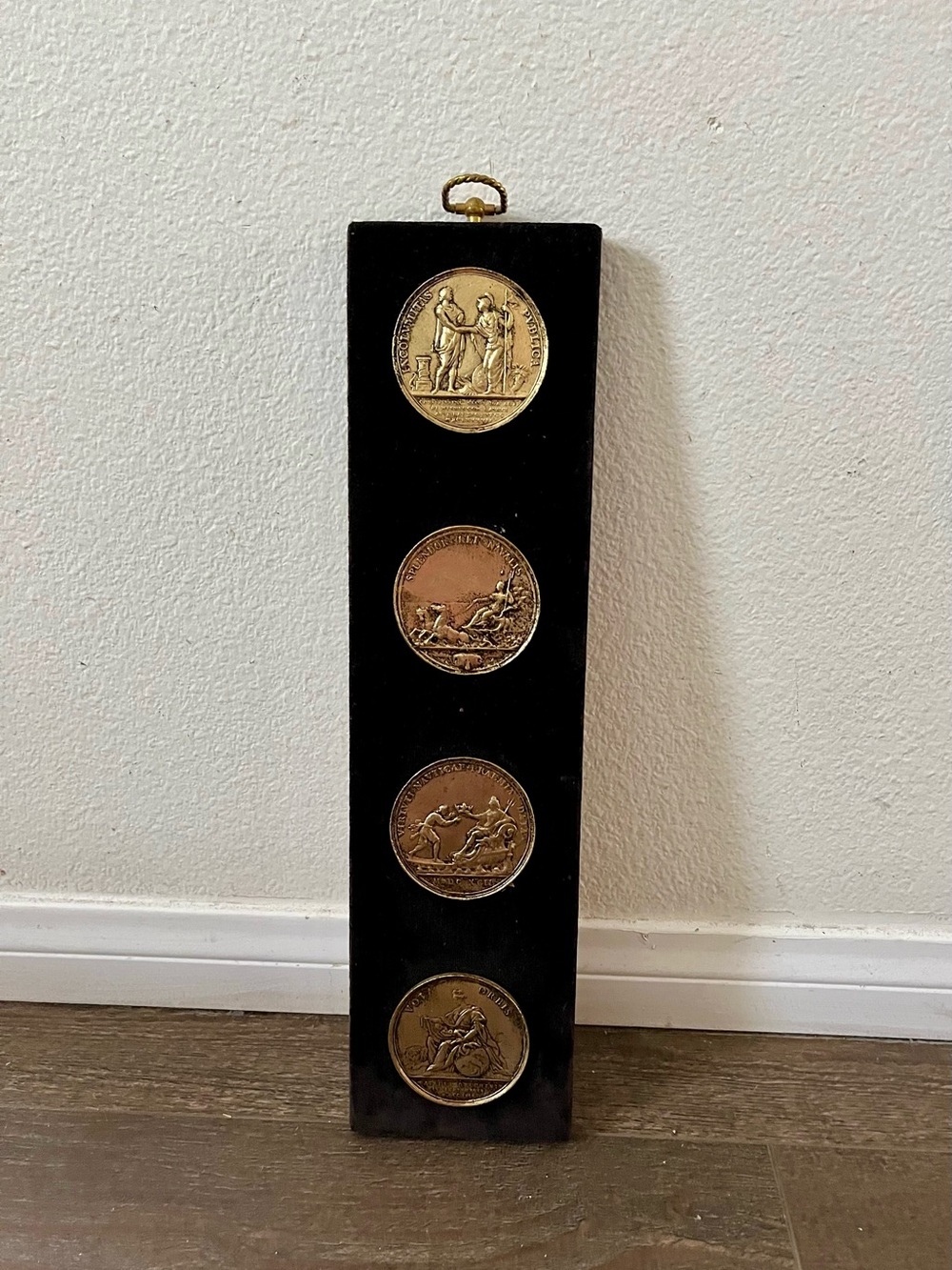 Black Velvet Wall Plaque with Four Brass Medallions